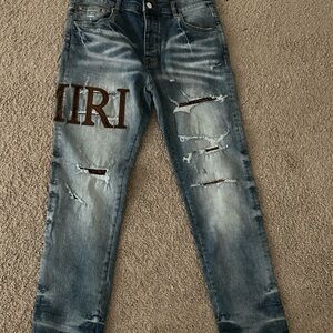 AMIRI Blue Distressed Slim Jeans with Brown Accents